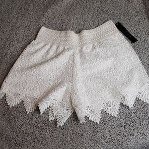 White lace shorts